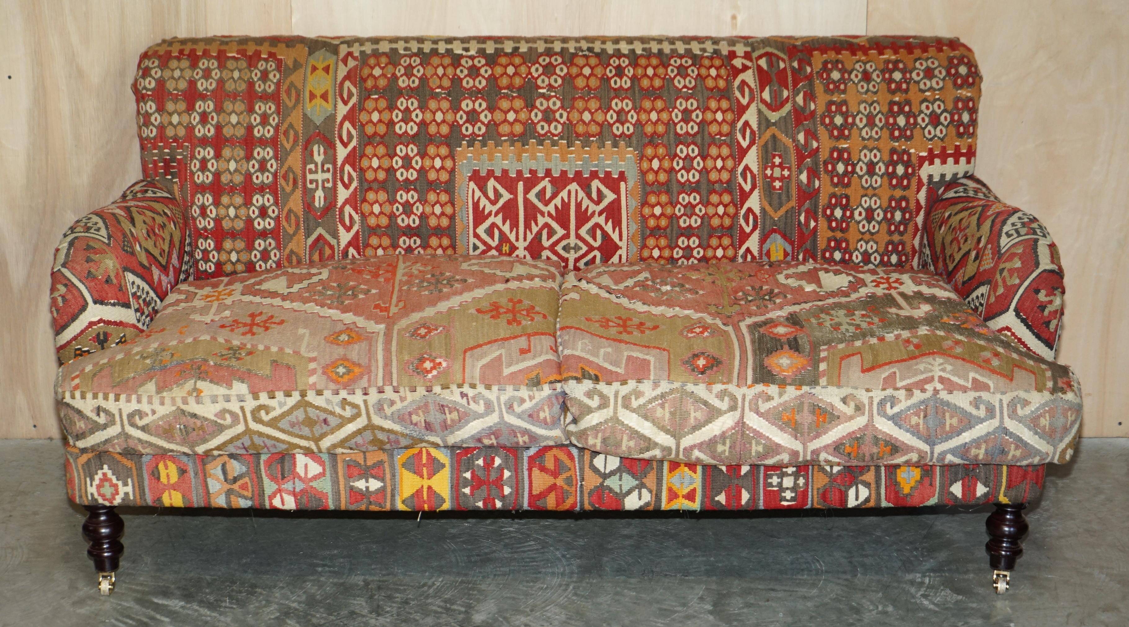 Vintage three-seater canapé by George Smith upholstered in Kilim with feather cushions.