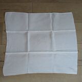 7 napkins with embroidered initials ML