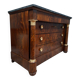 Empire commode in mahogany and flame mahogany veneer, 19th century.