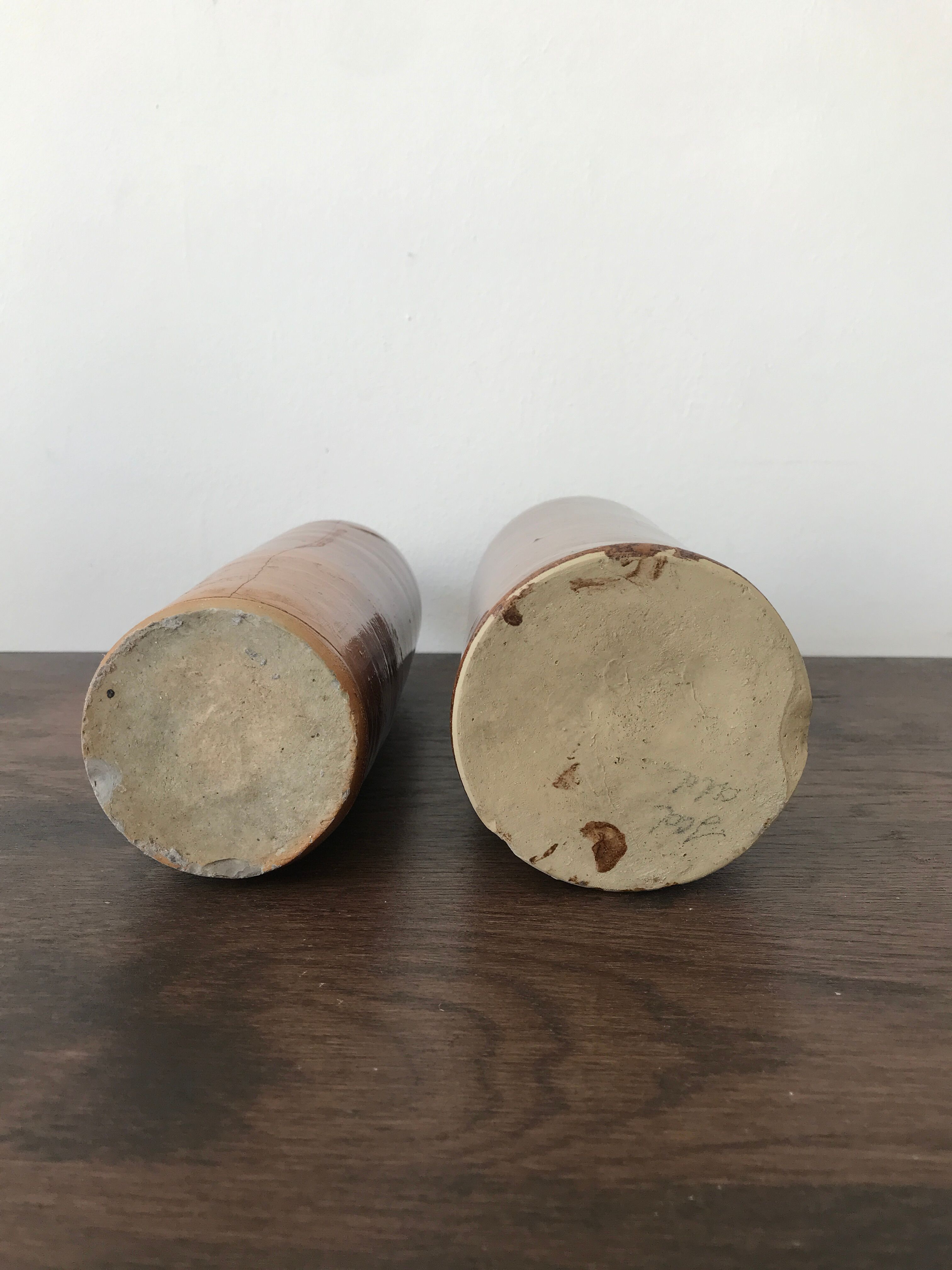 Pair of sandstone bottles