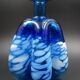 Blue glass vase and touches of white
