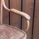 Curved wooden armchair
