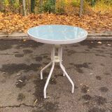 Round bistro table in steel with tulip base and glass top, 60cm