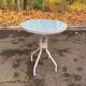 Round bistro table in steel with tulip base and glass top, 60cm