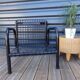 Duo de fauteuils noirs "grillage" en métal