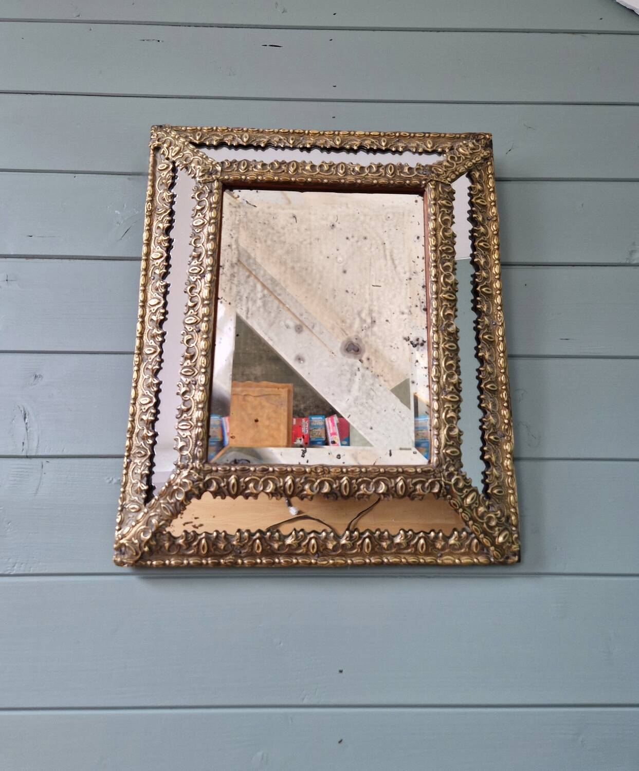 Mirror with embossed brass and mercury glass glazing beads, 19th century