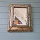 Mirror with embossed brass and mercury glass glazing beads, 19th century