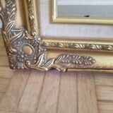 Old gilded frame in solid wood and plaster.