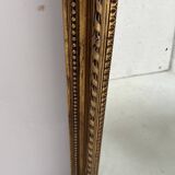Louis XVI style mirror in wood and gilded stucco, 19th century