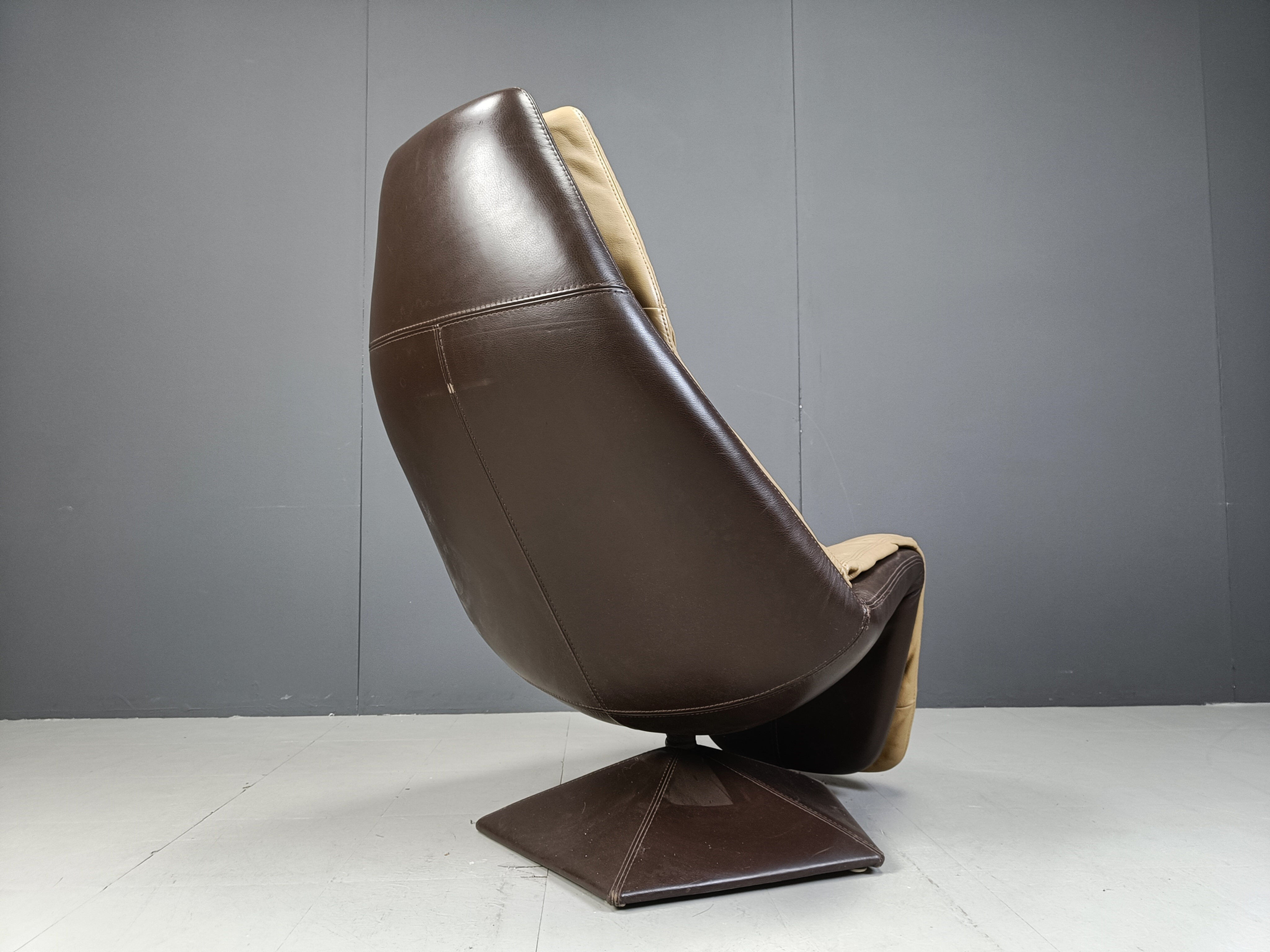 Vintage leather swivel chair with ottoman, 1970s