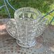Angel wings vase, in transparent glass with art deco relief pattern