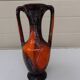 Vase with two orange handles