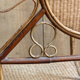 Asymmetrical rattan armchair