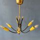 Vintage yellow spider suspension from the 1950s.
