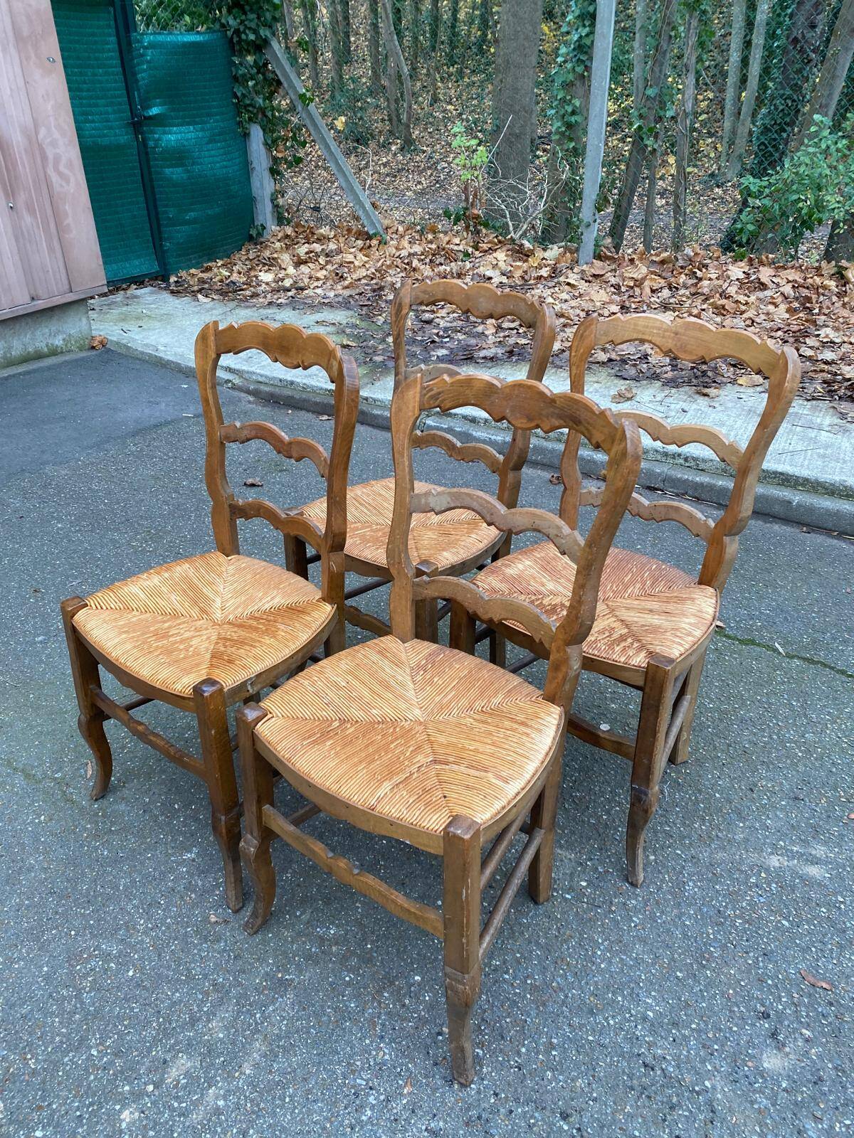 Four Louis XV chairs in solid oak and straw seats, 19th century