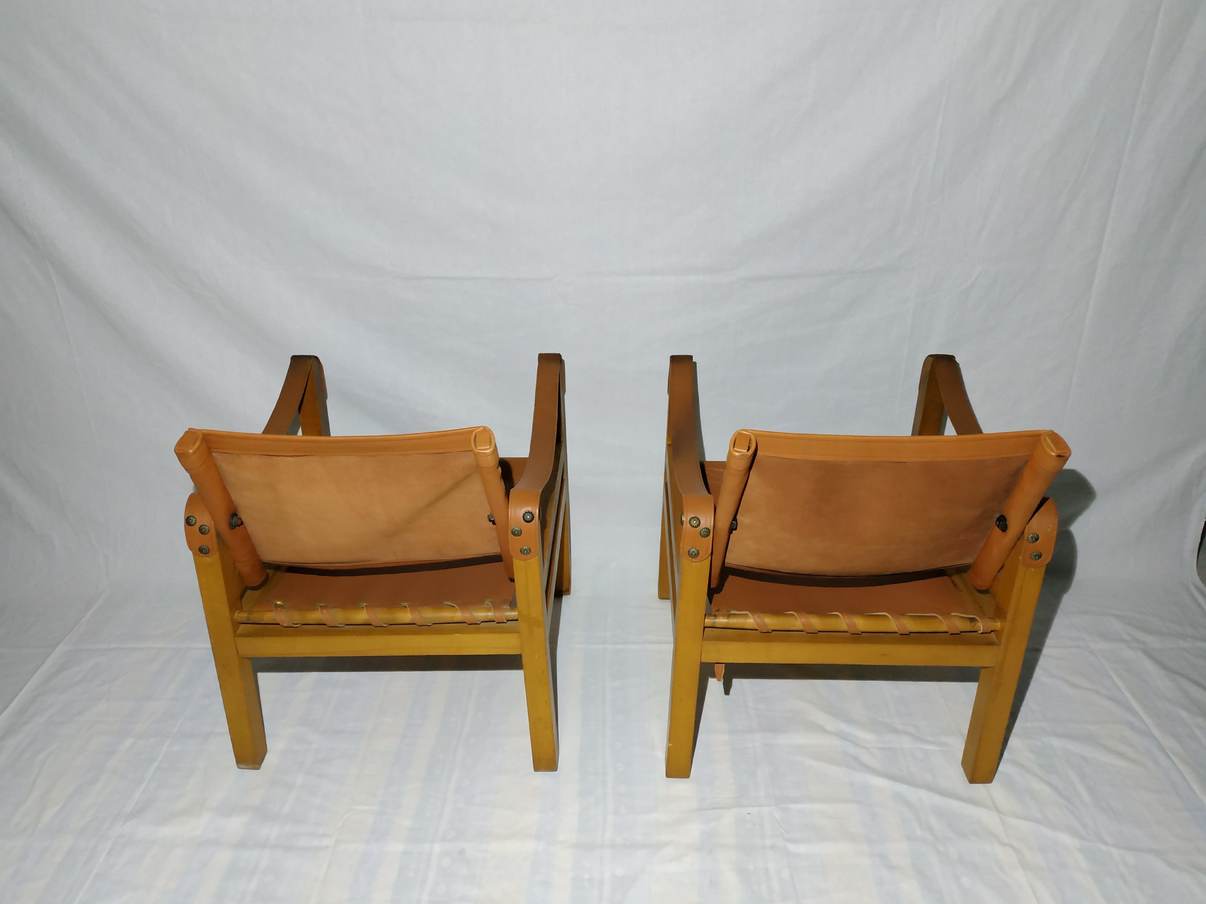 Pair of safari leather armchairs 50s