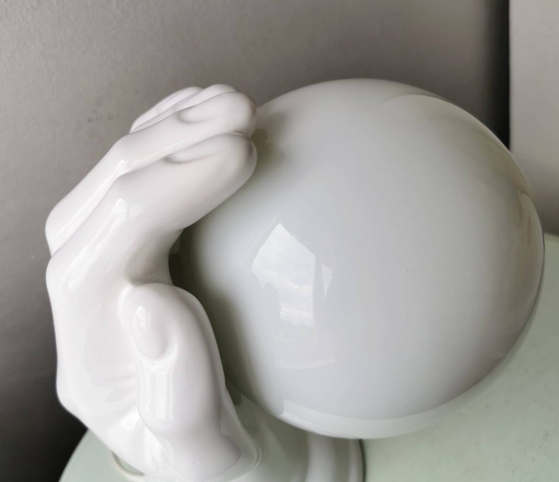 Hand-shaped ceramic wall lamp with 80s glass sphere