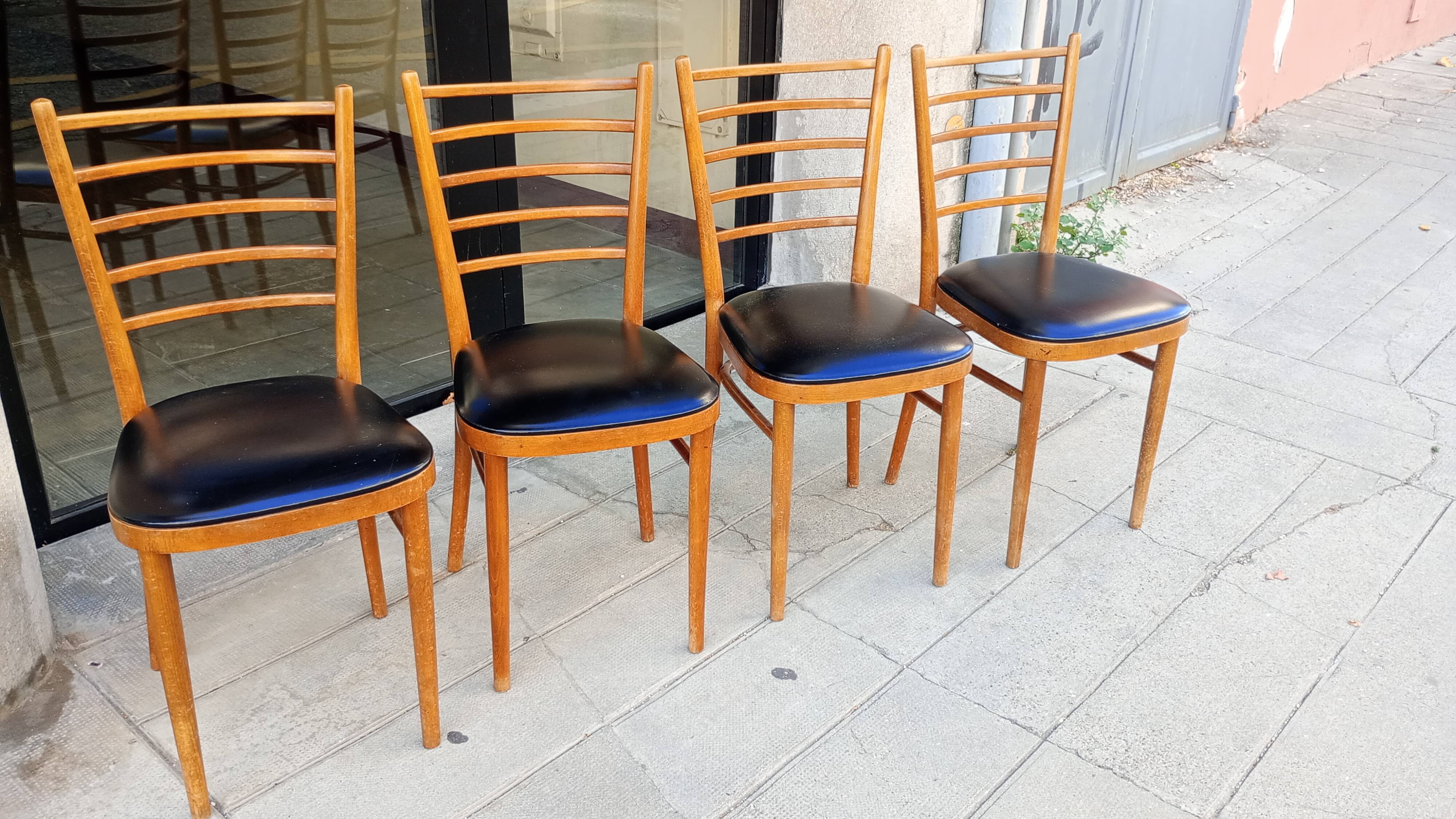 Lot of four antique chairs. Bistro. 1960.