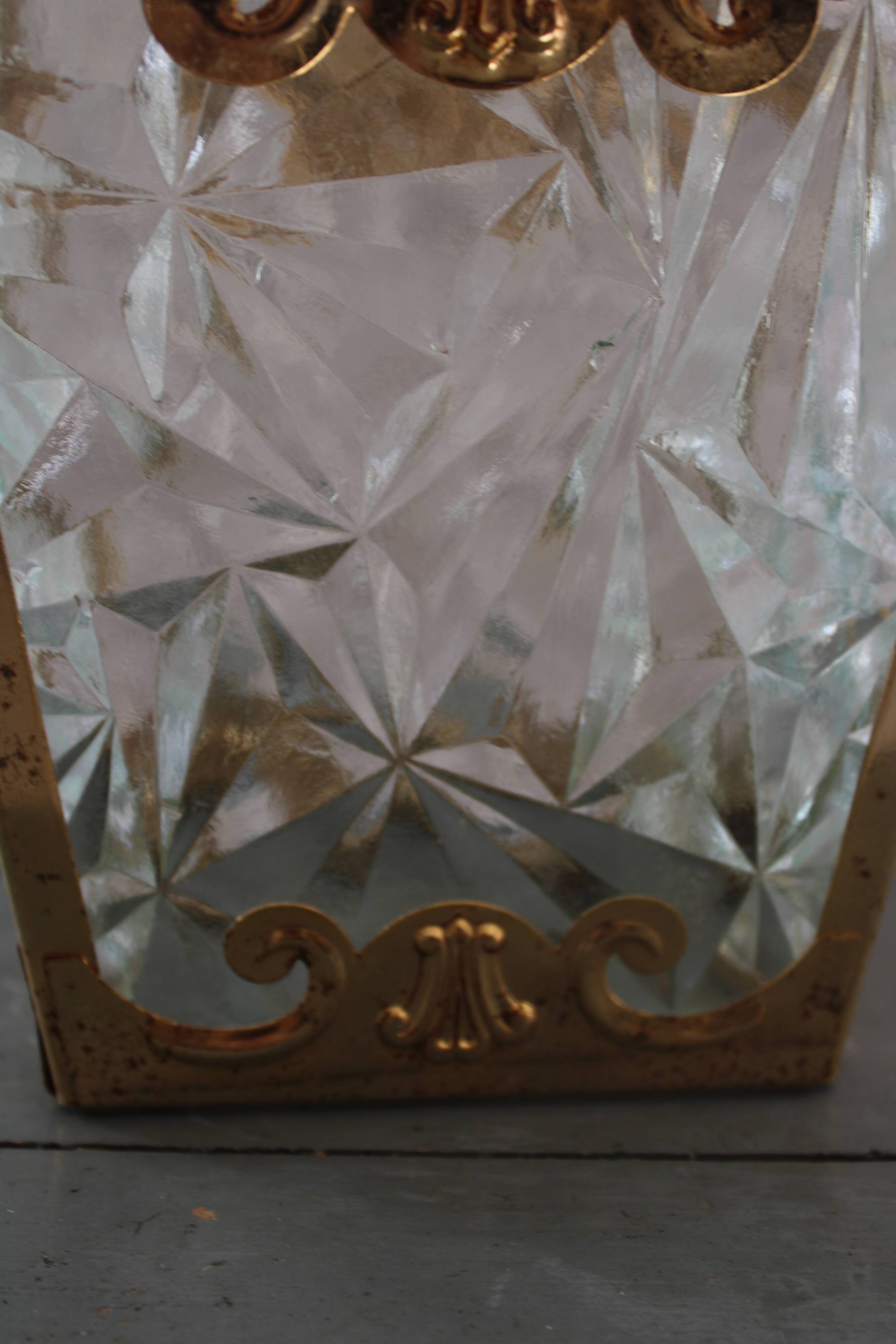 Glass and brass suspension