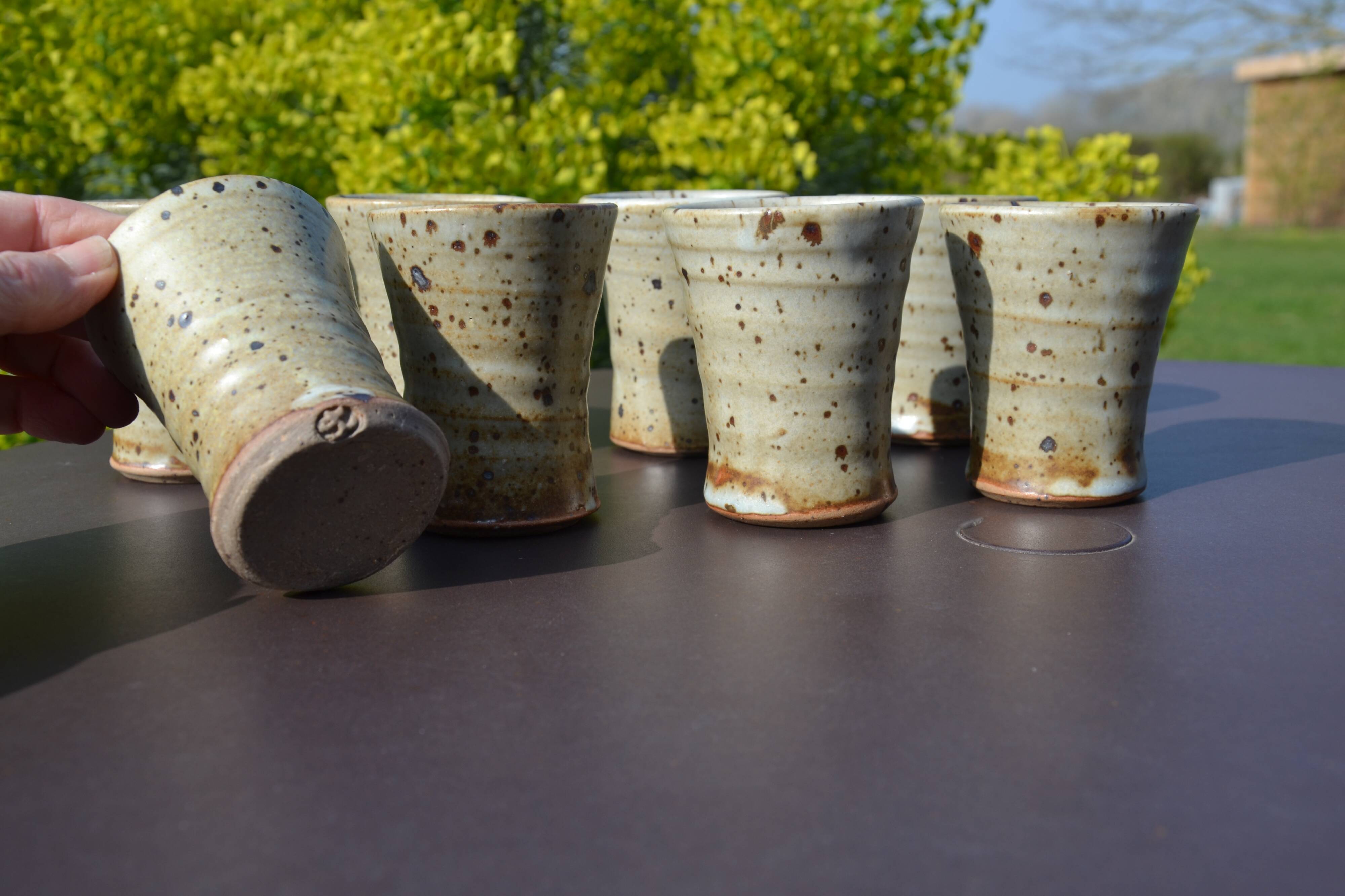 8 stoneware cups/mugs by Gustave Tiffoche