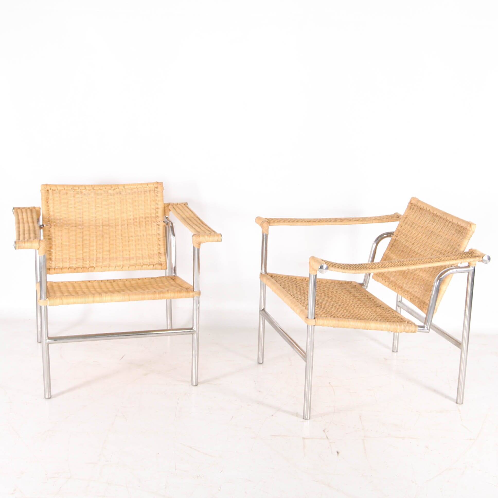 Pair of wicker and chrome armchairs