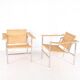 Pair of wicker and chrome armchairs