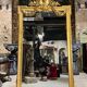 Monumental mirror Napoleon III in gilded wood with the profile of Apollo