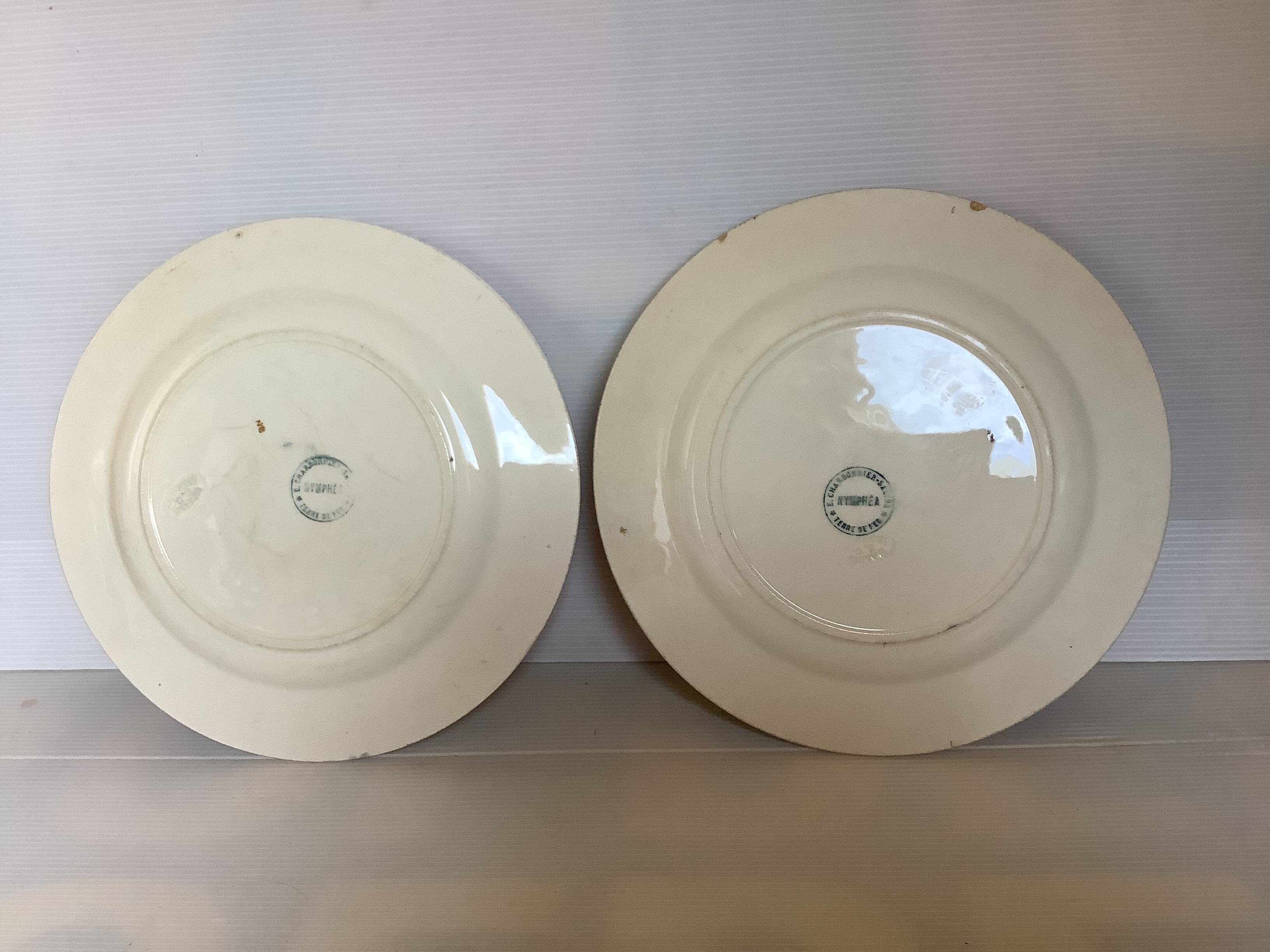 Pair of old iron earth water lily plates