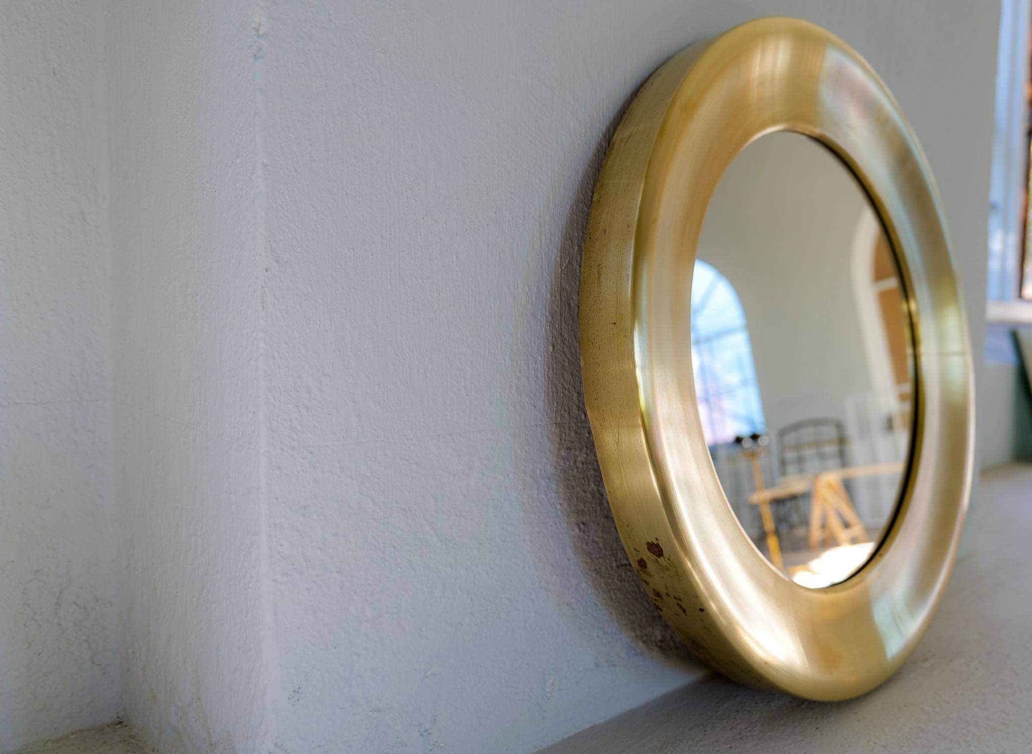 Modern round brass mirror from the mid-century by Glasmäster in Markaryd, Sweden, 1960s.