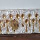 12 small spoonfuls a mocha in golden metal