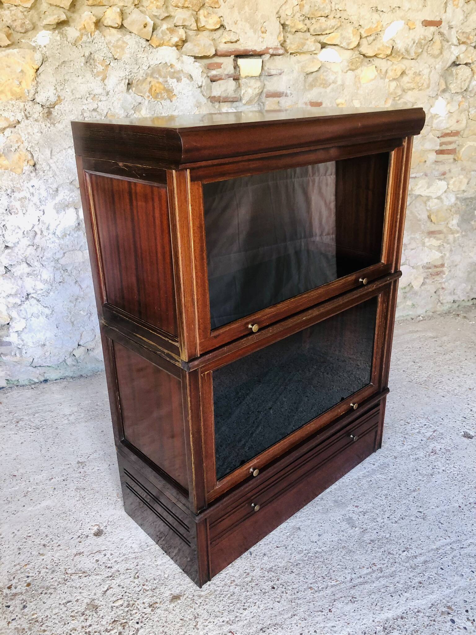 Vintage mahogany avocado bookcase with overhead glass doors circa 40's/50's