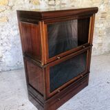 Vintage mahogany avocado bookcase with overhead glass doors circa 40's/50's