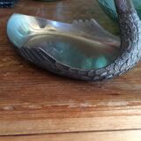 “Swan” pocket emptier