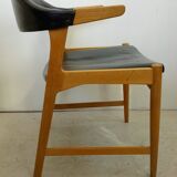 Danish armchair in oak and black leather