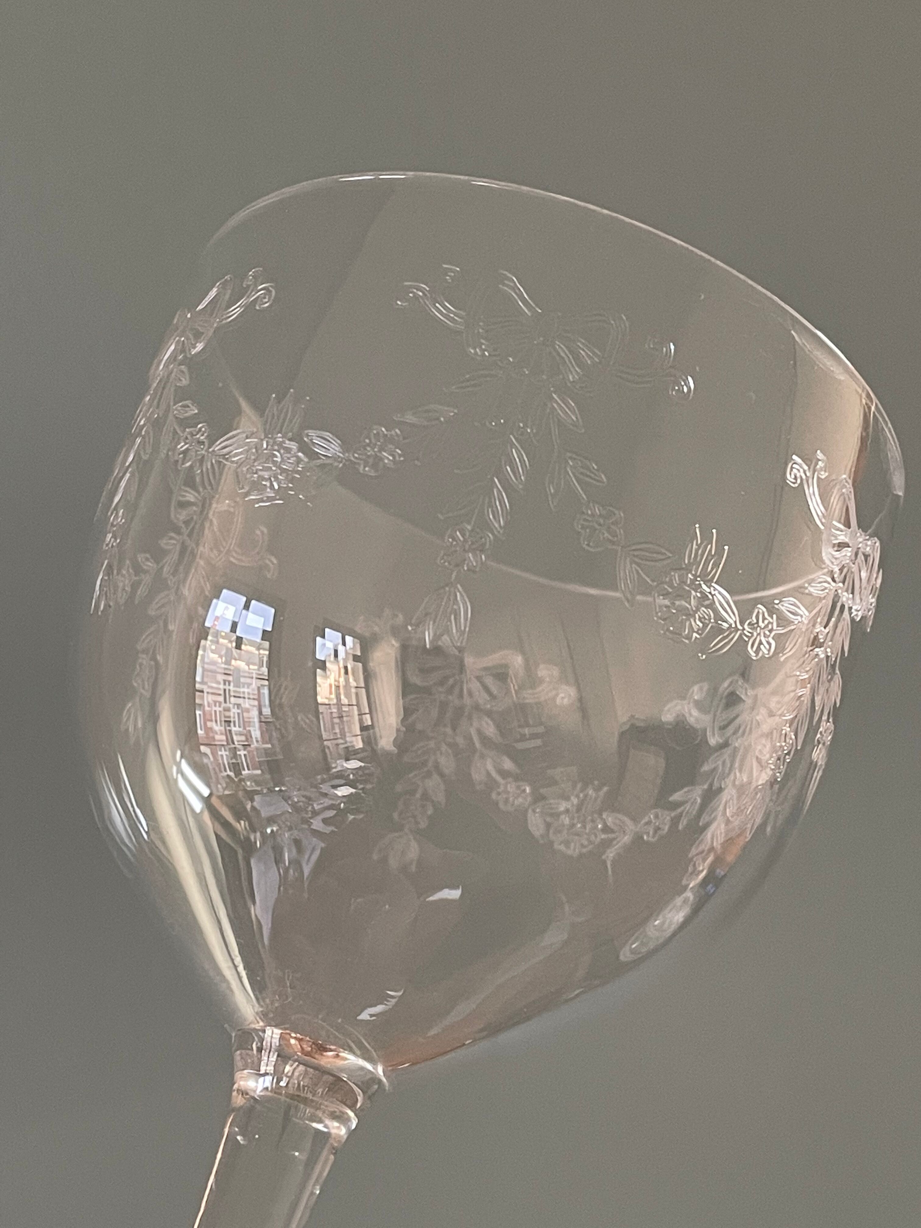 Set of 4 antique chiseled crystal foot glasses