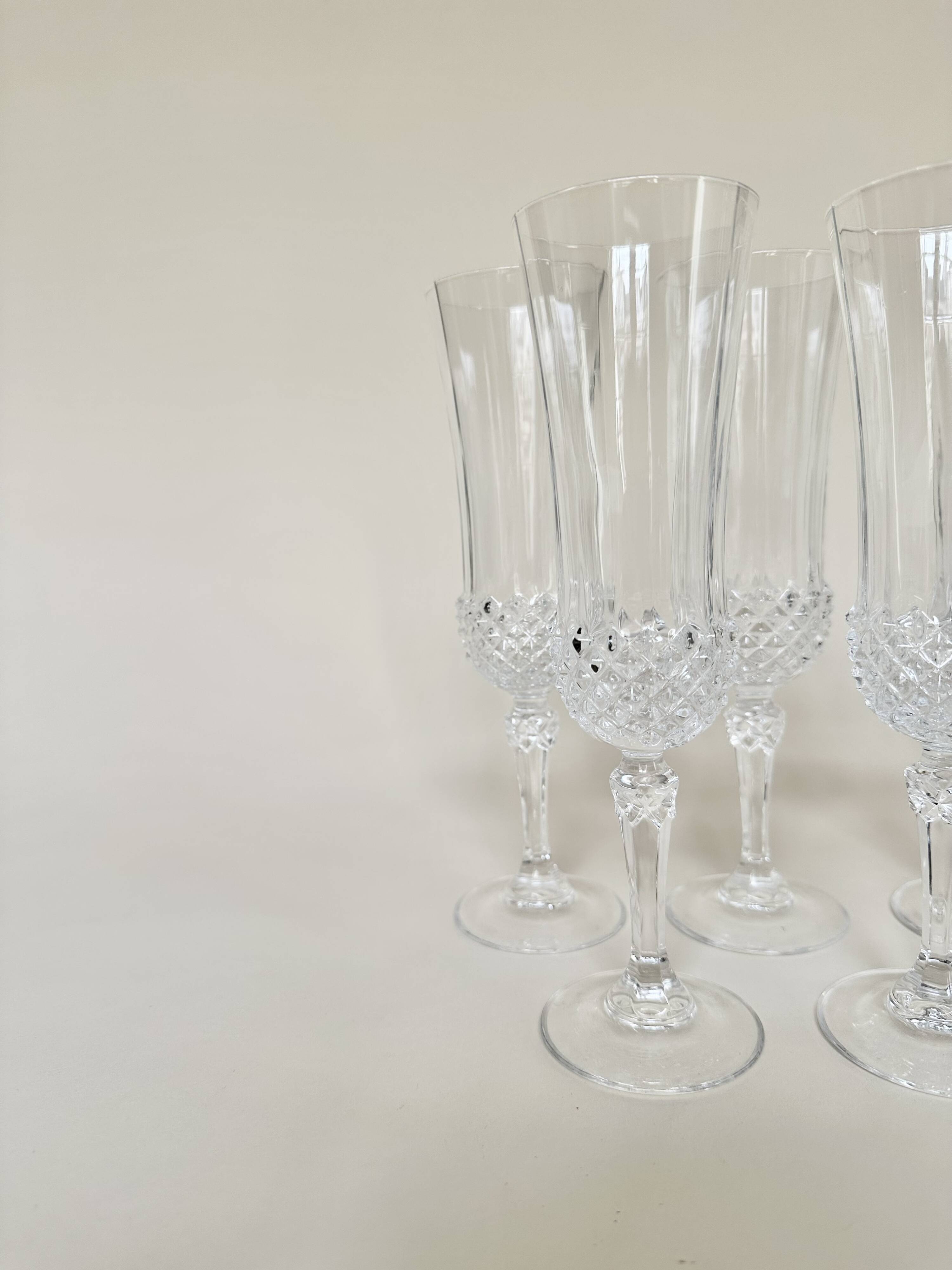 Set of 5 Cristal d'Arques champagne flutes