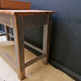 Patinated drapery table