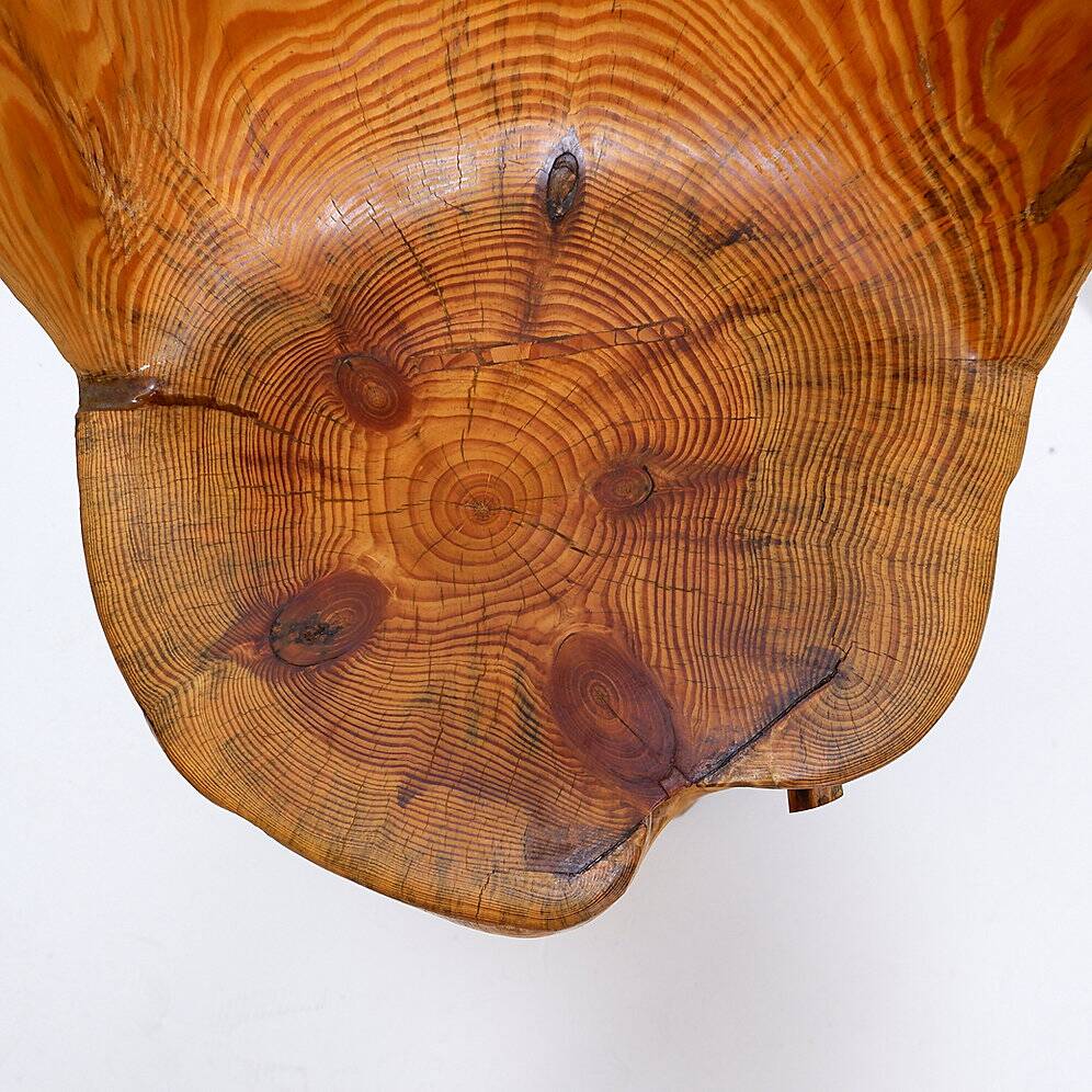 Brutalist sculptural chair in solid oak in wabi-sabi style.