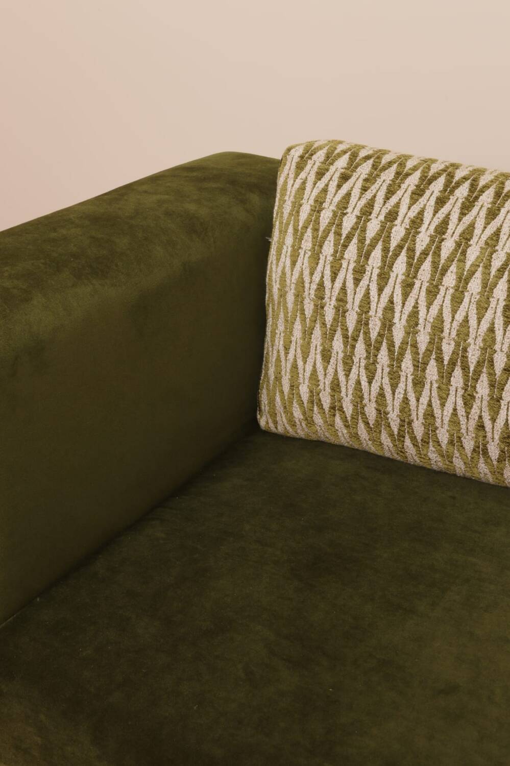 Olive velvet two-seater sofa