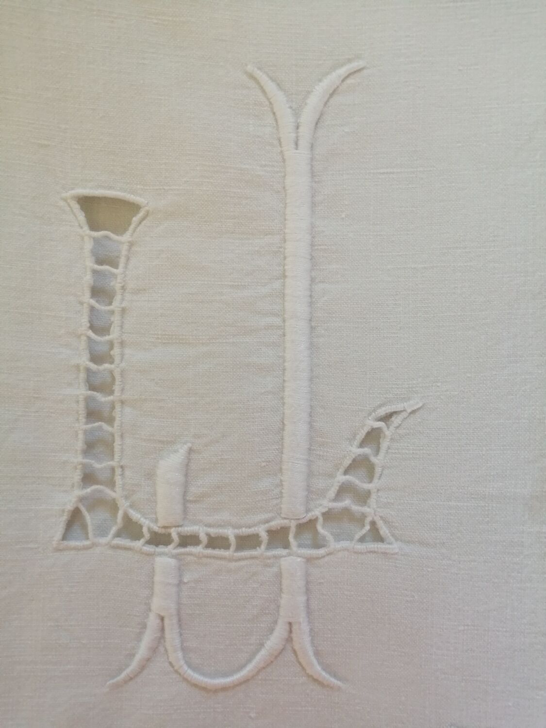 Linen cloth with monogram.