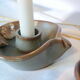 Pair of cellar rat candle holders in glazed sandstone