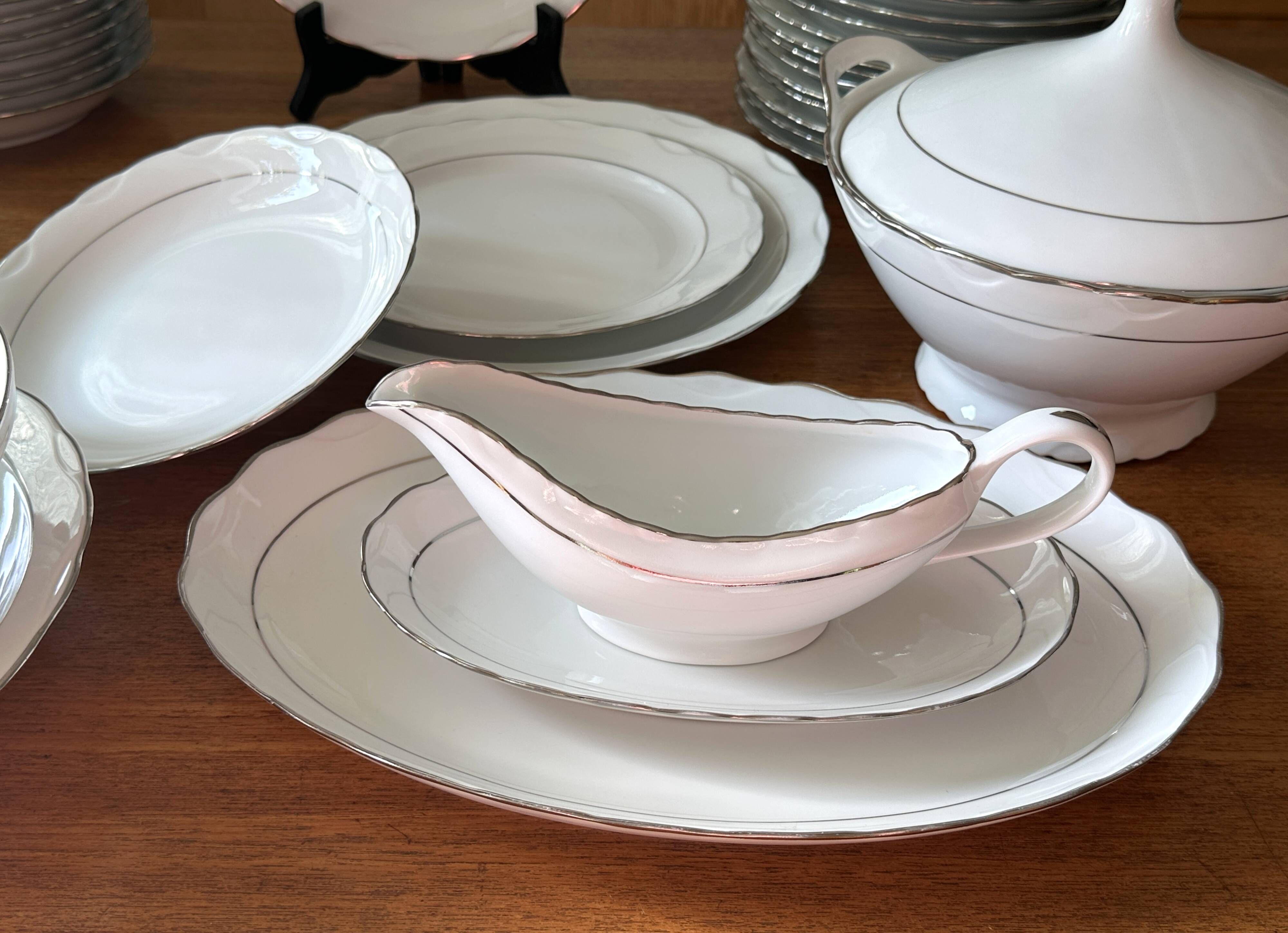 White and silver table service, Limoges porcelain, 56 pieces - in good condition.
