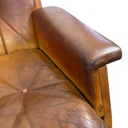 Pair of vintage cognac leather swivel lounge chairs by Eugen Schmidt
