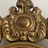 Old mirror in gilded wood