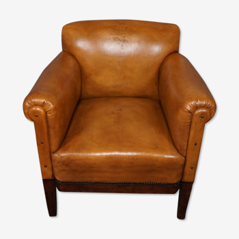 Fauteuil ancien en peau de mouton