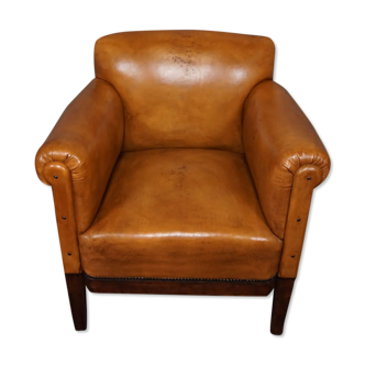 Old sheepskin armchair