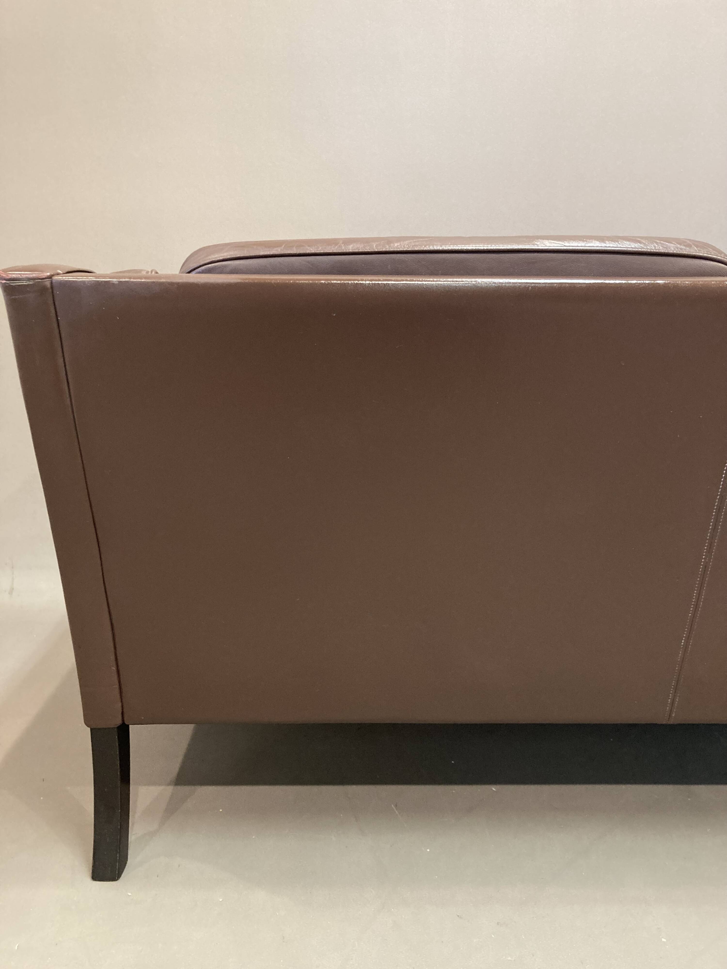 Scandinavian design 3-seater leather sofa.