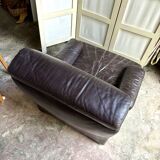 Brown leather armchair