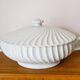 Oval white porcelain soup tureen by Haviland, torso model.