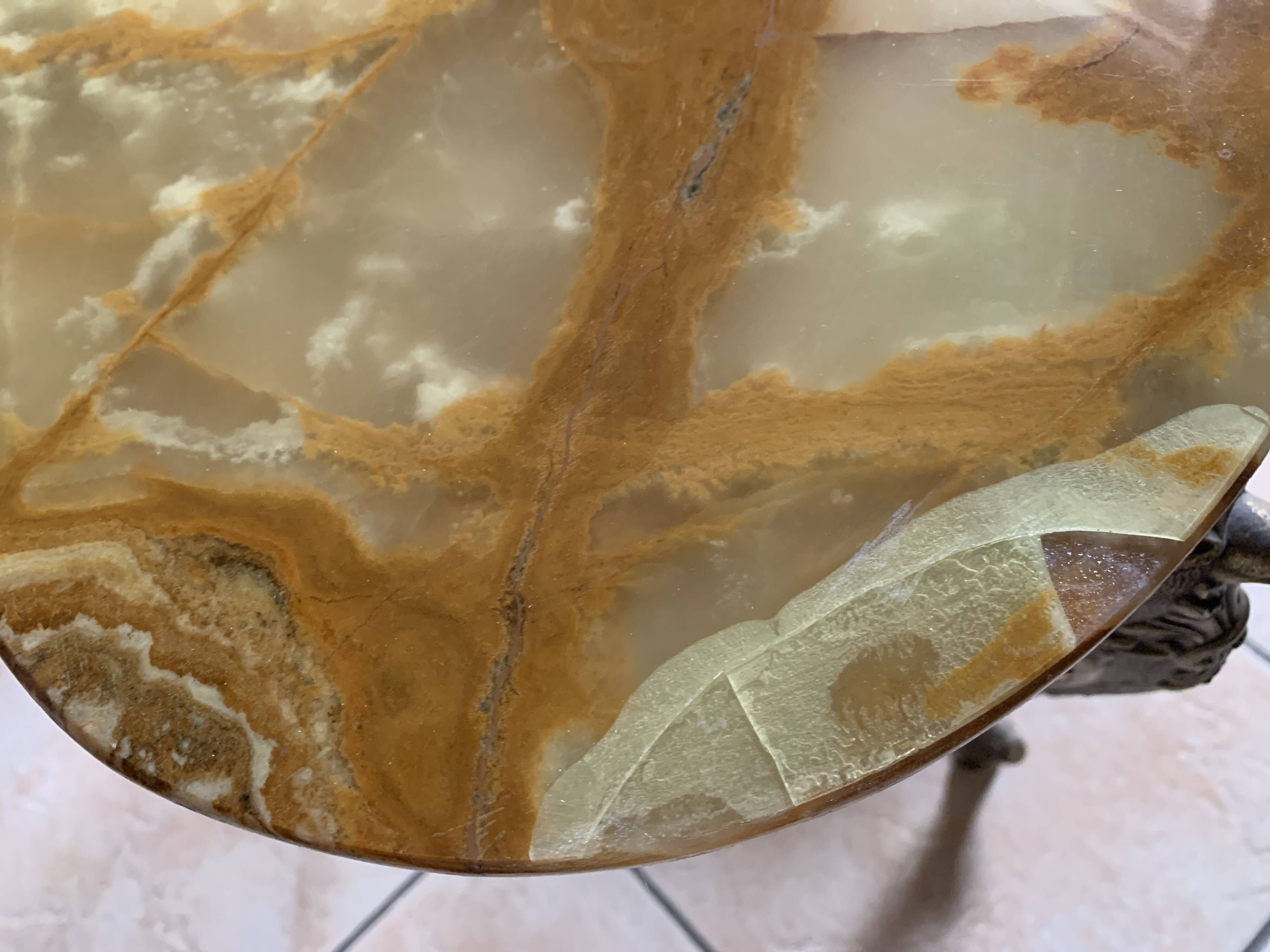 Lot of 3 marble and brass nesting tables.